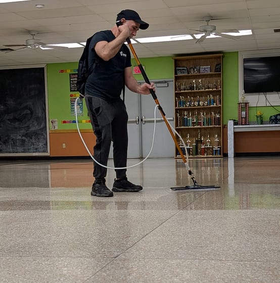 Cronos technician performing commercial floor care